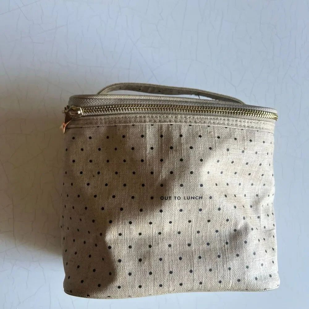 Kate Spade New York "Out to Lunch" insulated tote bag featuring a beige canvas d